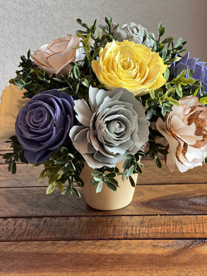 Sola Wood floral arrangement in terra cotta pot