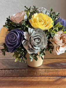 Sola Wood floral arrangement in terra cotta pot