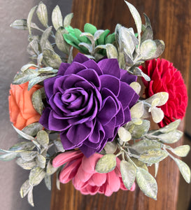 Sola wood flowers in small metal milk jug