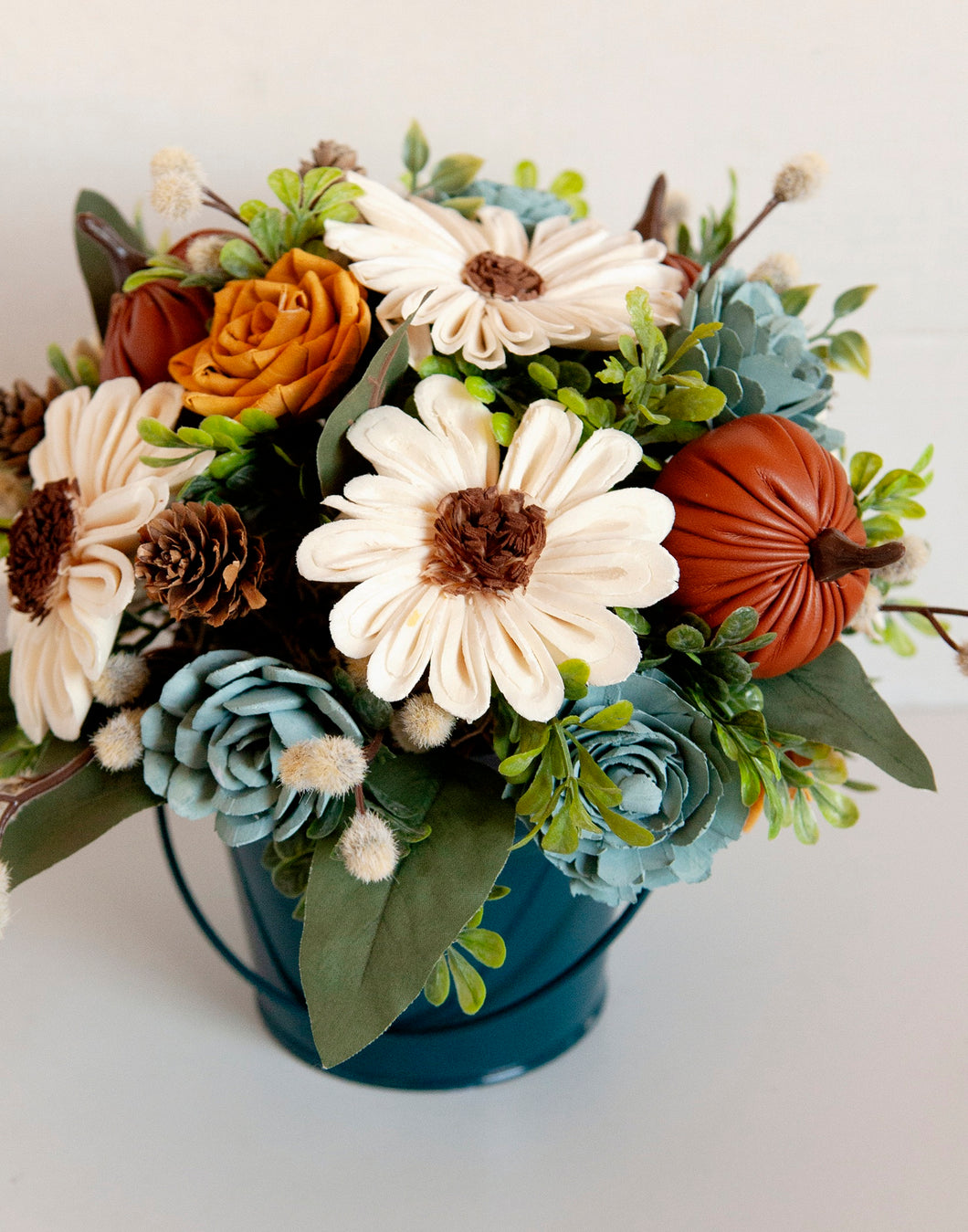 Sola wood floral arrangement in metal tin