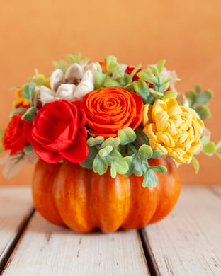 Sola wood flowers on faux pumpkin