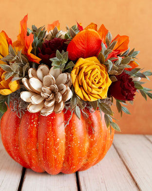 Sola wood flowers on faux pumpkin