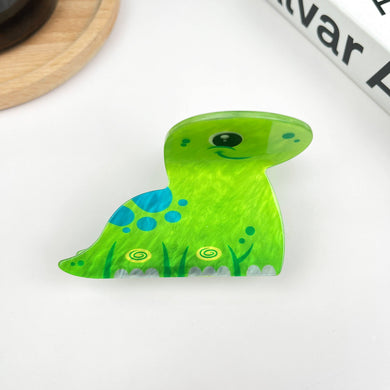 Green dinosaur clip