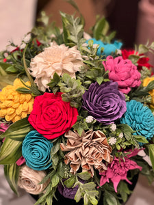 Sola Wood Flower arrangement arranged on lid of candle