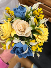 Sola wood flowers in small metal milk jug