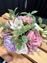 Sola wood flowers in a pink elephant