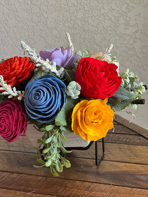 Sola wood flowers in metal wheel barrow