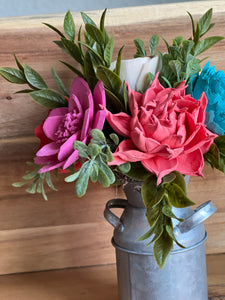 Sola wood flowers in small metal milk jug