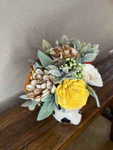 Sola Wood floral arrangement in Cow planter