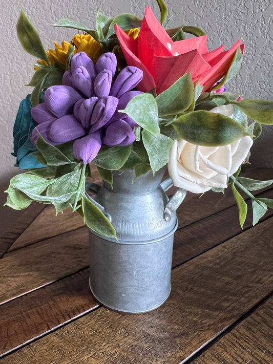 Sola wood flowers in small metal milk jug