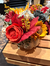 Sola wood flowers on faux pumpkin