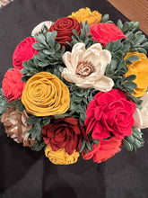 Sola wood flowers on faux pumpkin