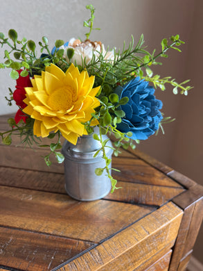 Sola wood flowers in small metal milk jug