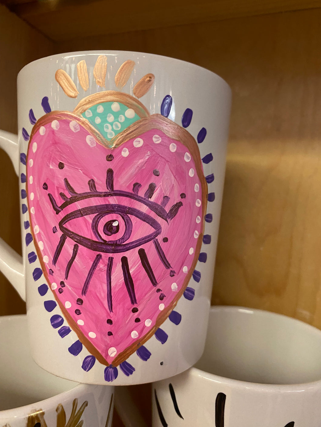 Blue evil eye coffee mug