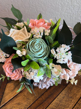 Sola wood floral arrangement in metal tin
