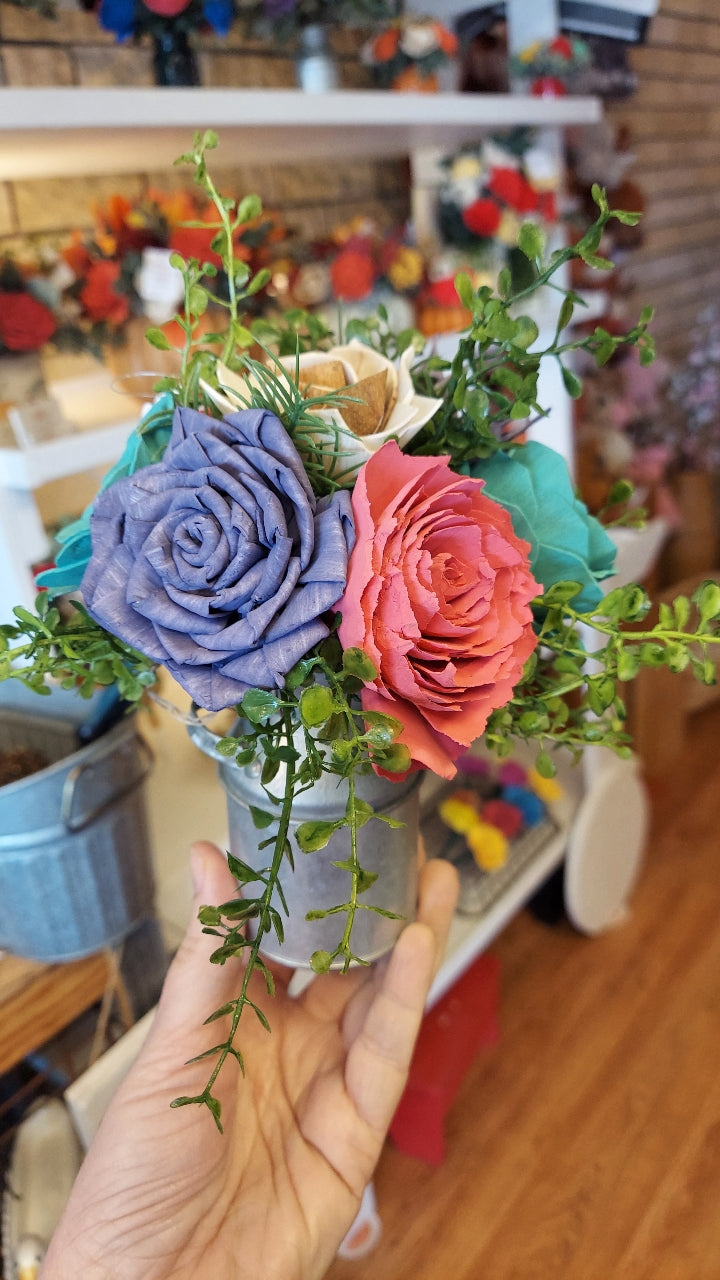 Sola wood flowers in small metal milk jug