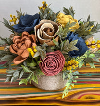 Sola wood floral arrangement in ceramic container