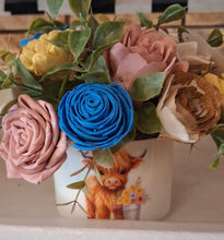 Sola wood flowers in ceramic container with Cow
