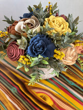Sola wood floral arrangement in ceramic container