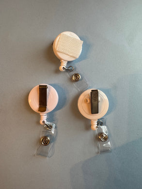Badge reel bases