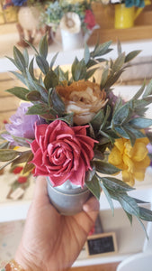 Sola wood flowers in small metal milk jug