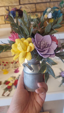 Sola wood flowers in small metal milk jug