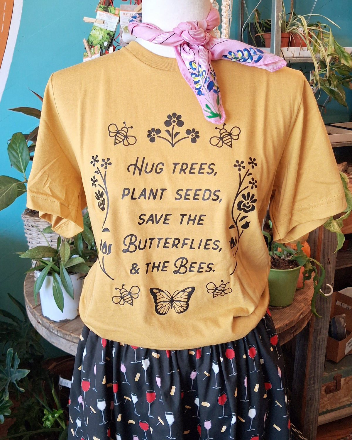 T-shirt- Hug trees, plant seeds, save the butterflies, & the bees.